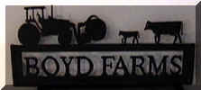 Silhouette Tractor Feeding Cattle Sign